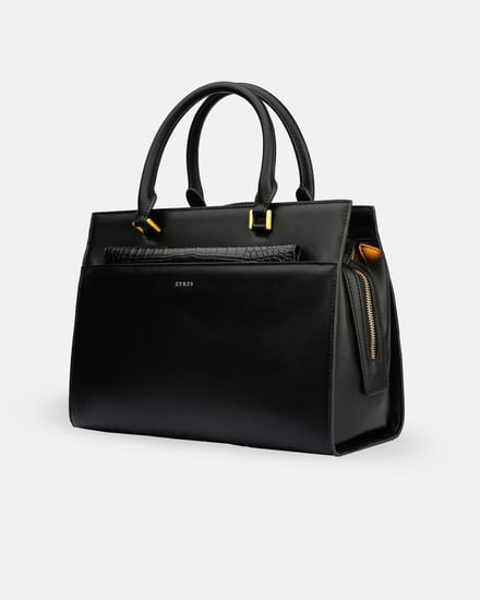 شنطة نسائية بحجم متوسط من الجلد بلون أسود