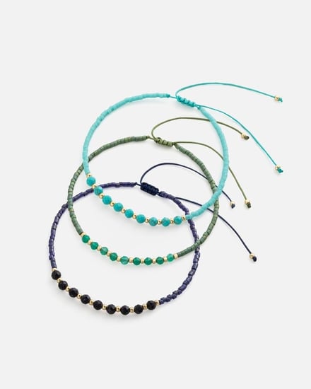 اساور من الخيوط والخرز بلون فيروزي وزيتي وبنفسجي