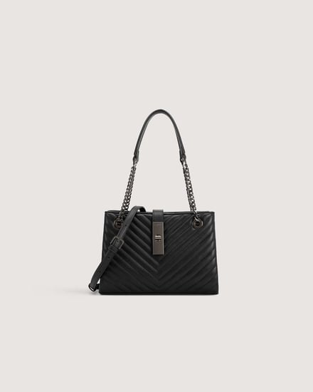 ‎ شنطة بلون أسود بحجم كبير لكل الأوقات