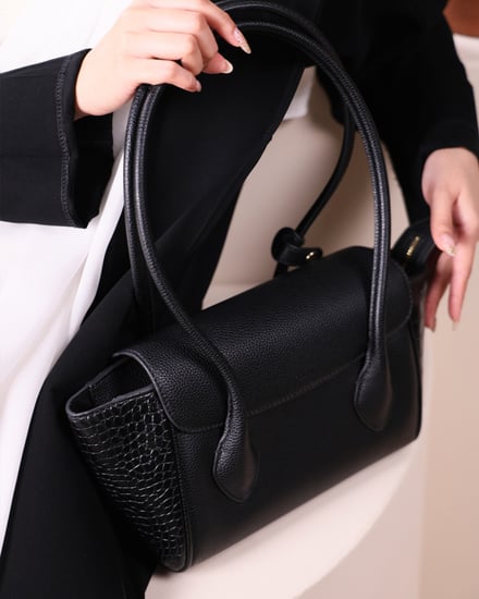 شنطة أناقة النسائية جلد بلون أسود