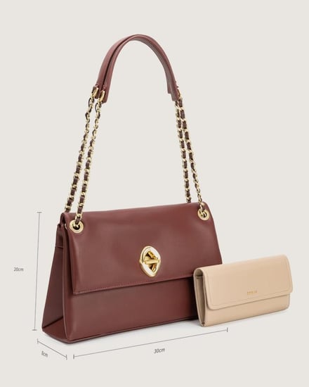 شنطة نسائية بمقاس كبير من الجلد بلون عودي