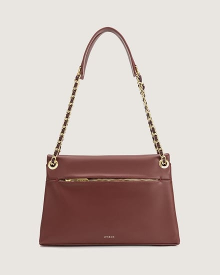 شنطة نسائية بمقاس كبير من الجلد بلون عودي