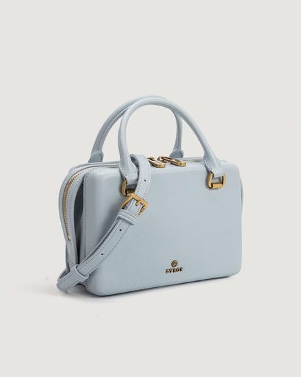 شنطة نسائية بتصميم أنيق بلون أزرق فاتح