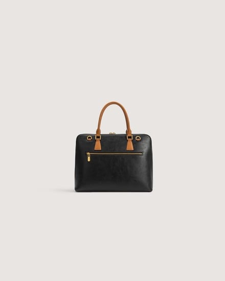 شنطة للعمل من الجلد بلون أسود تناسب الجنسين.