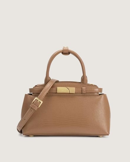 شنطة نسائية من الجلد الفاخر بلون بني