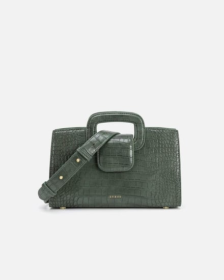 شنطة نسائية تعبر عن الأناقة بلون أخضر