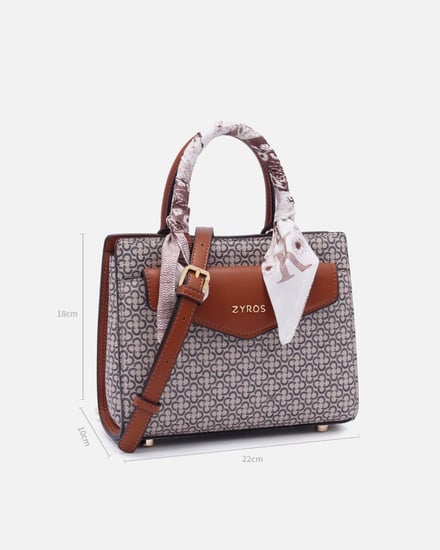 شنطة نسائيه من القماش والجلد بلون بني