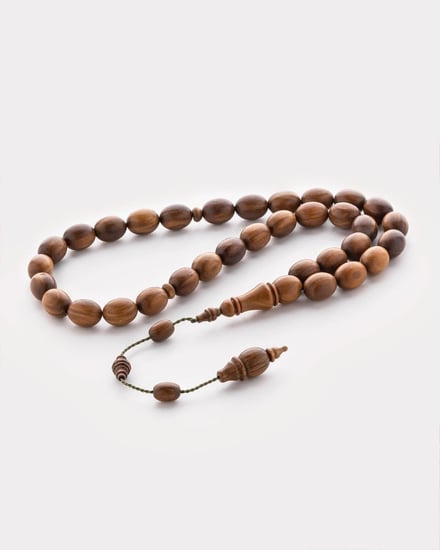 سبحة خشب الصندل باللون البني