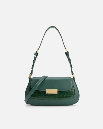 شنطة من الجلد بتصميم لكل يوم بلون أخضر