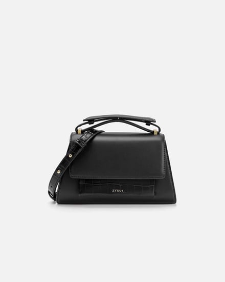 شنطة ترمز للأناقة وتناسب كل إطلالاتك بلون أسود