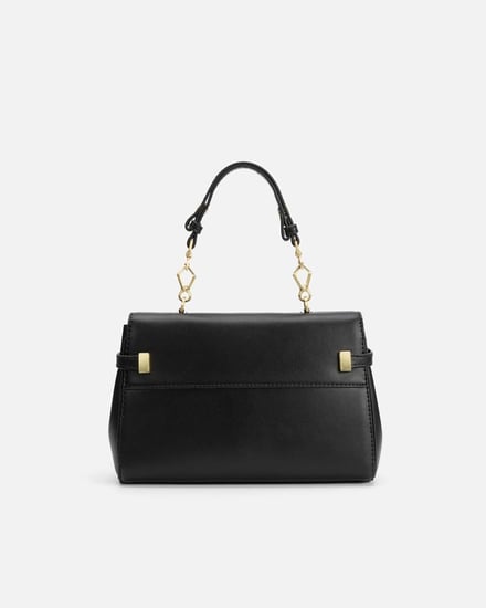 شنطة نسائية بلمسة من الفن بلون أسود