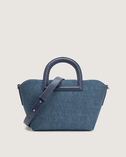 شنطة نسائية من القماش الجينز بلون أزرق