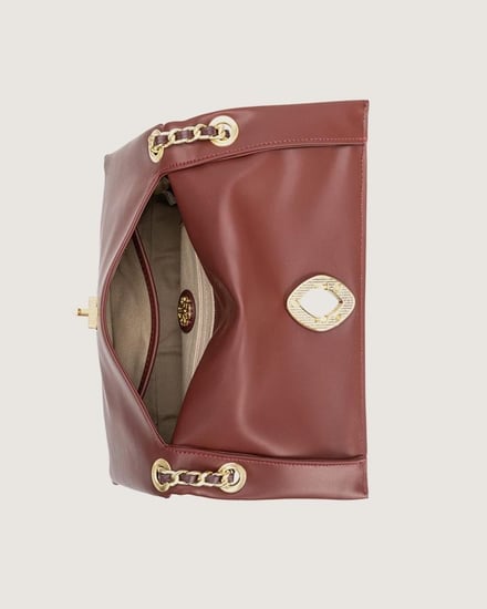 شنطة نسائية بمقاس كبير من الجلد بلون عودي