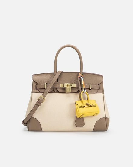 شنطة نسائية واسعة بلون بني فاتح وبيج