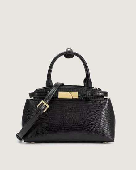 شنطة نسائية من الجلد الفاخر بلون أسود