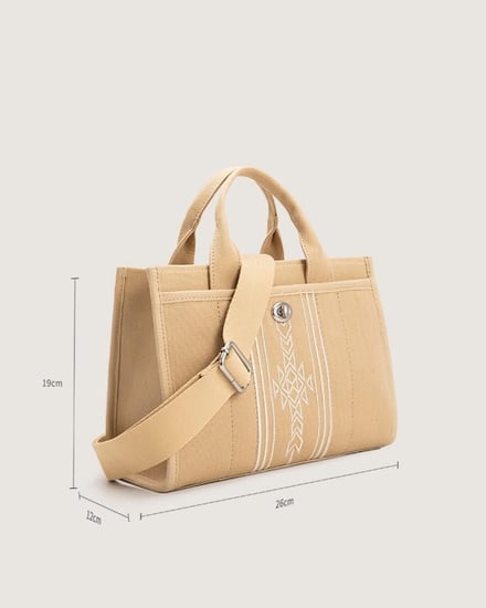 شنطة نسائية بحجم واسع بلون بيج