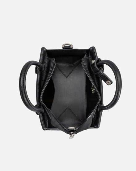 شنطة نسائية من الجلد بلون أسود