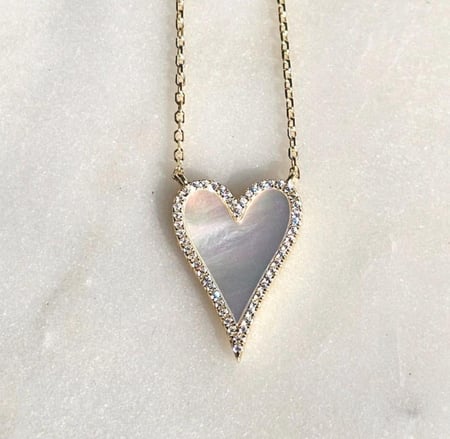 White heart ذهبي