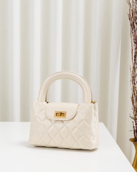 شنطة فريدة حجم صغير  باللون السكري