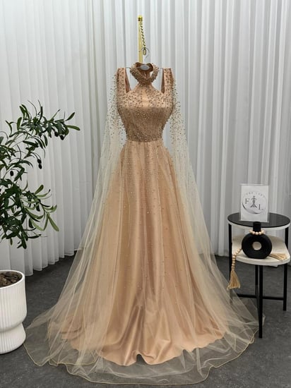 فستان سهرة اللون بيج   نوع القماش تفته استرتش قطعه تل شك من  متجر جوهرهFR