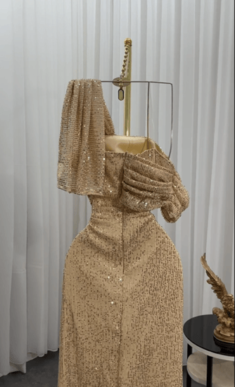 فستان سهره  اللون ذهبي   من  متجر جوهره  QN