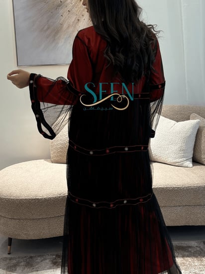 جلابيه عسيريه باللون الأحمر