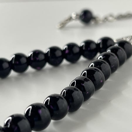 مسباح كوارتز  (أسود لماع بفص أزرق)