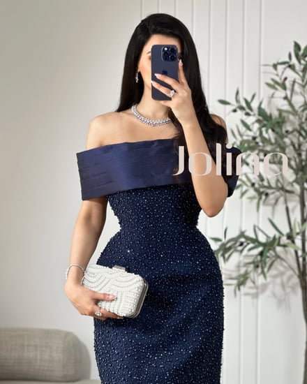 فستان سهرة كحلي طويل أوف شولدر مطرز بترتر لامع