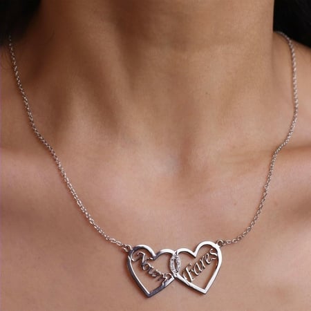 سلسال بتصميم قلبين مع زركون