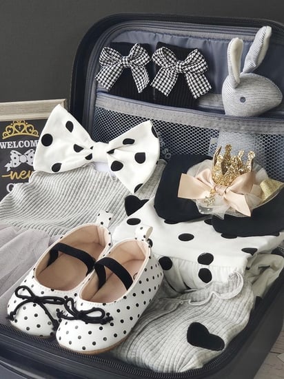 شنطة ملابس المواليد القلادة الفضية