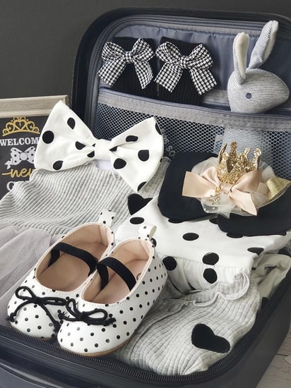 شنطة ملابس المواليد القلادة الفضية