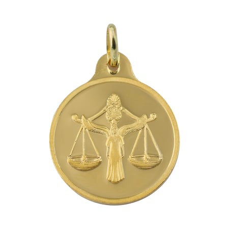 جنيه برج الميزان ذهب بي تي سي عيار 24 بوزن 8,2 غرام مع تعليقة