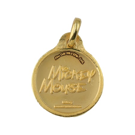 جنيه ذهب ميكي ماوس عيار 24 بي تي سي بوزن 8,2 غرام مع تعليقة