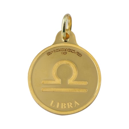 جنيه برج الميزان ذهب بي تي سي عيار 24 بوزن 8,2 غرام مع تعليقة