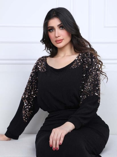 فستان سهرة قماش لمعه ستريتش مزين بترتر بالاكتاف