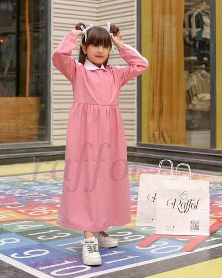 مريول ابتدائي وردي بأكمام بتفصيلة بيضاء