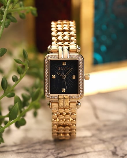 ساعة نسائيه بسير من الستيل بلون ذهبي