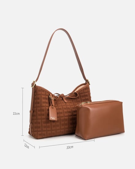 شنطة نسائيه بتصميم عملي بلون بني