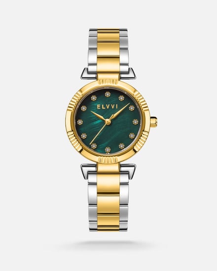 ساعة نسائيه من الستيل بلون فضي وذهبي من الفــــي