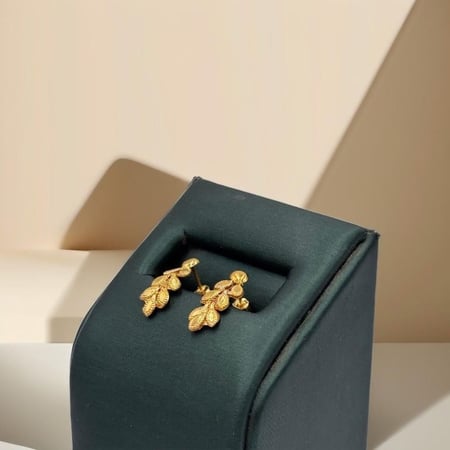 حلق غصن الزيتون ذهب عيار 21