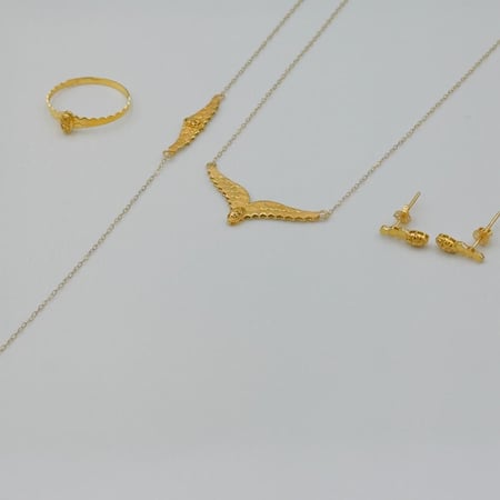 طقم ذهب جناح الصقر عيار 21 - مجوهرات قصر المدينة للذهب - الدمام