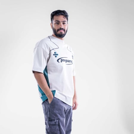 تيشيرت اوفر سايز نص كم بكتابة اماميه وخطوط منحنيه - بيج