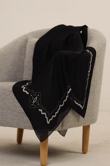 White guipure chest with lace cuffs and shaded godets