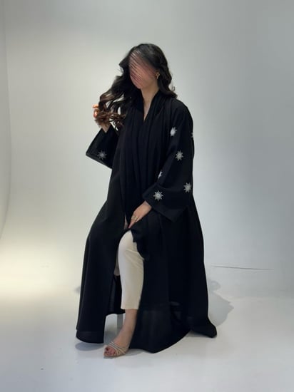 كتان مطرز شمس أبيض