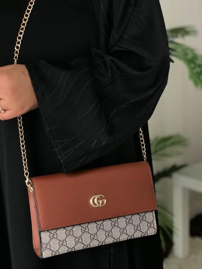 شنطه جوتشي هاي كواليتي معا ملحقاتها