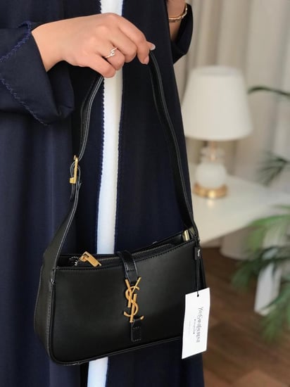 شنطه سان لوران هاي كواليتي معا ملحقاتها