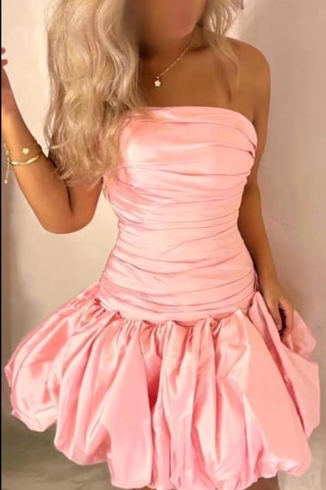 فستان وردي السن المحير