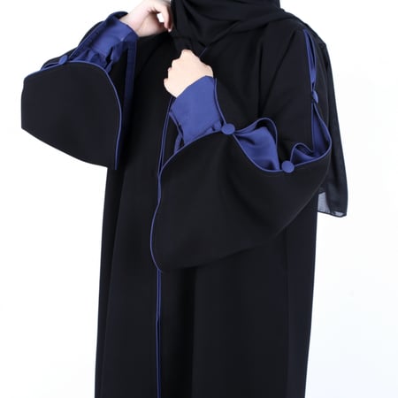 0057 عبايه زهره النور باكمام ازرق ازرار