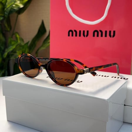 نظارة - MIU MIU اطار تايقر- عدسة بني