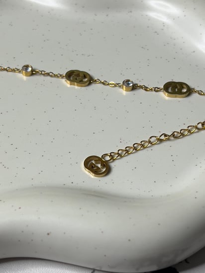 اسوارة GUCCI ذهبي